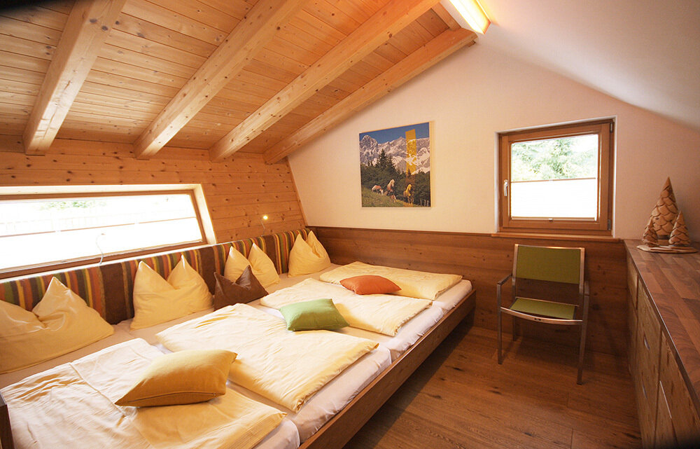 Bedroom for up to 4 people in the Alpin Chalet Classic.