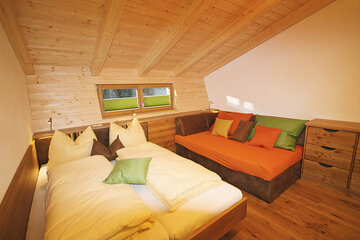 Schlafnest bei Zweierbelegung mit Doppelbett im Alpin Chalet Large.