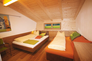 Schlafnest bei Zweierbelegung mit Einzelbetten im Alpin Chalet Large.