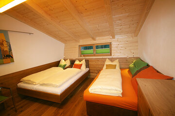 Bedroom for 3 persons in the Alpin Chalet Large in Filzmoos.